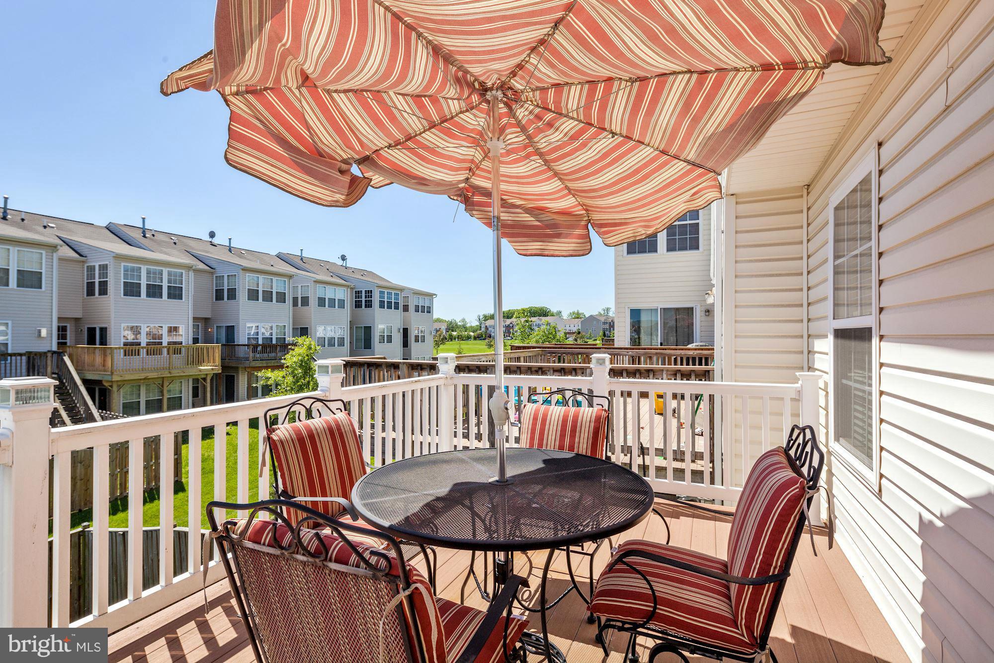 9851 Decatur Road Baltimore, MD 21220 - Photo 22 of 24 a view of a chair and tables in the balcony