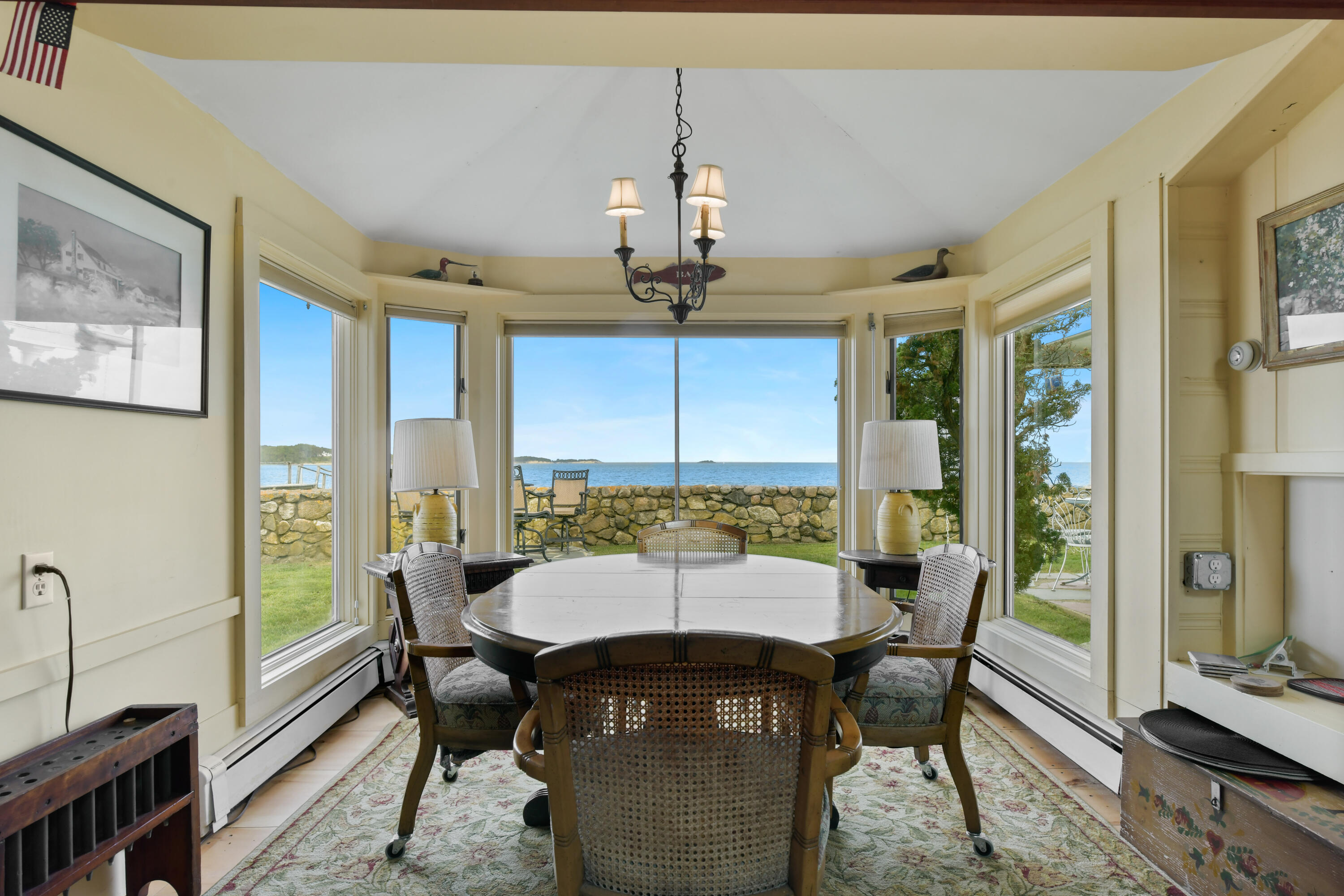645 South Orleans Road Orleans, MA 02653 - Photo 15 of 57 a view of a dining room with furniture window and outside view