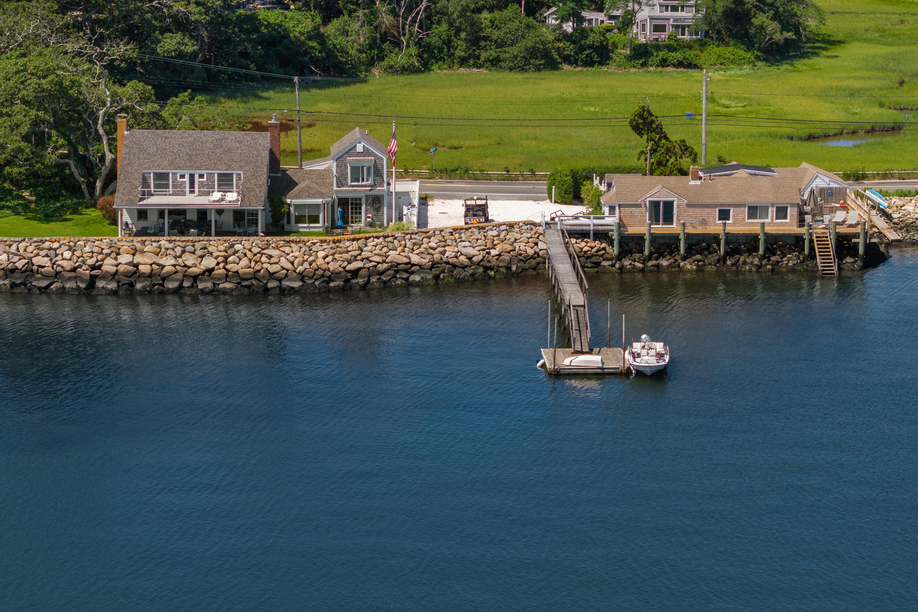 645 South Orleans Road Orleans, MA 02653 - Photo 2 of 57 an aerial view of a house with outdoor space lake view and boat