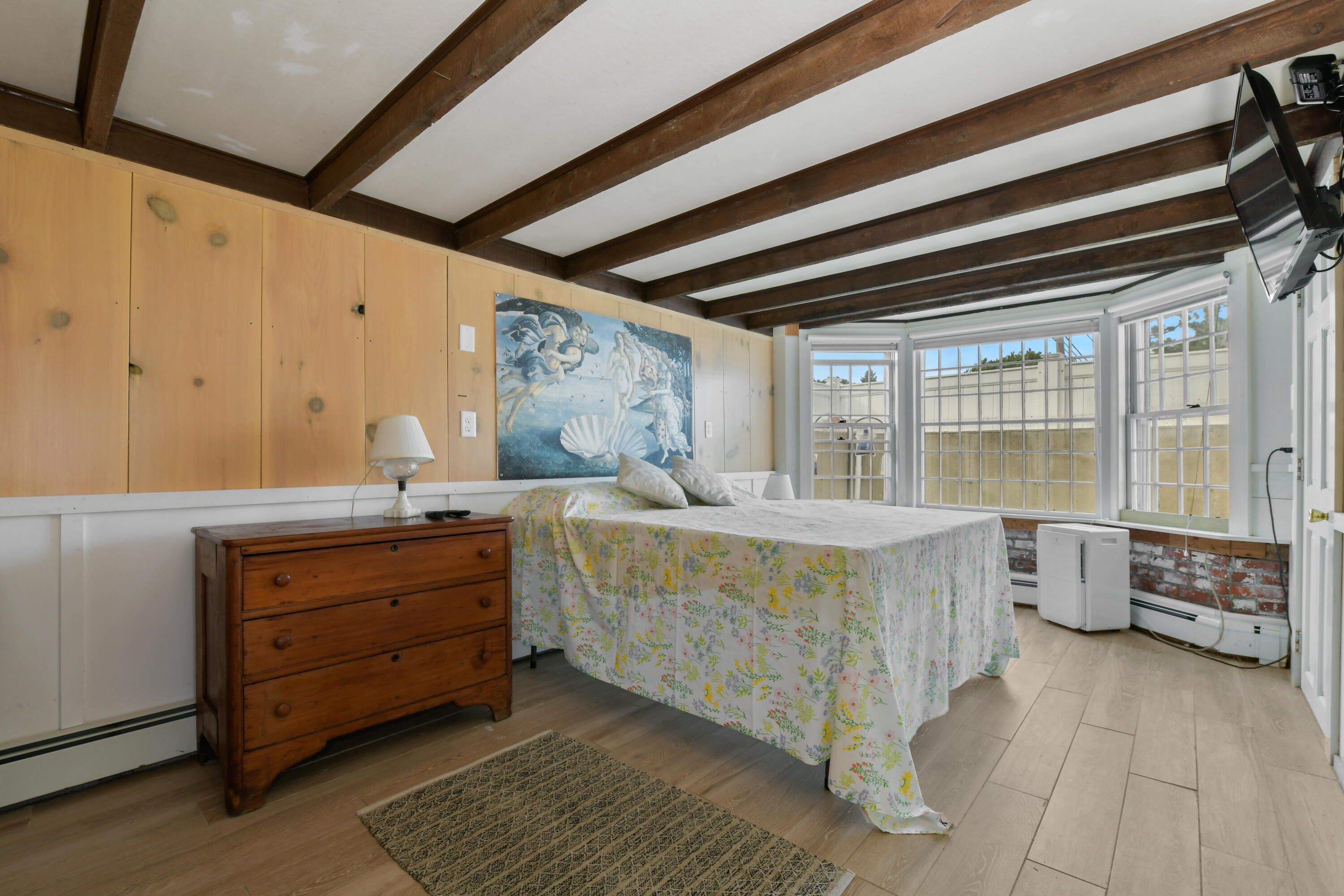 645 South Orleans Road Orleans, MA 02653 - Photo 22 of 57 a bed room with a bed and a window