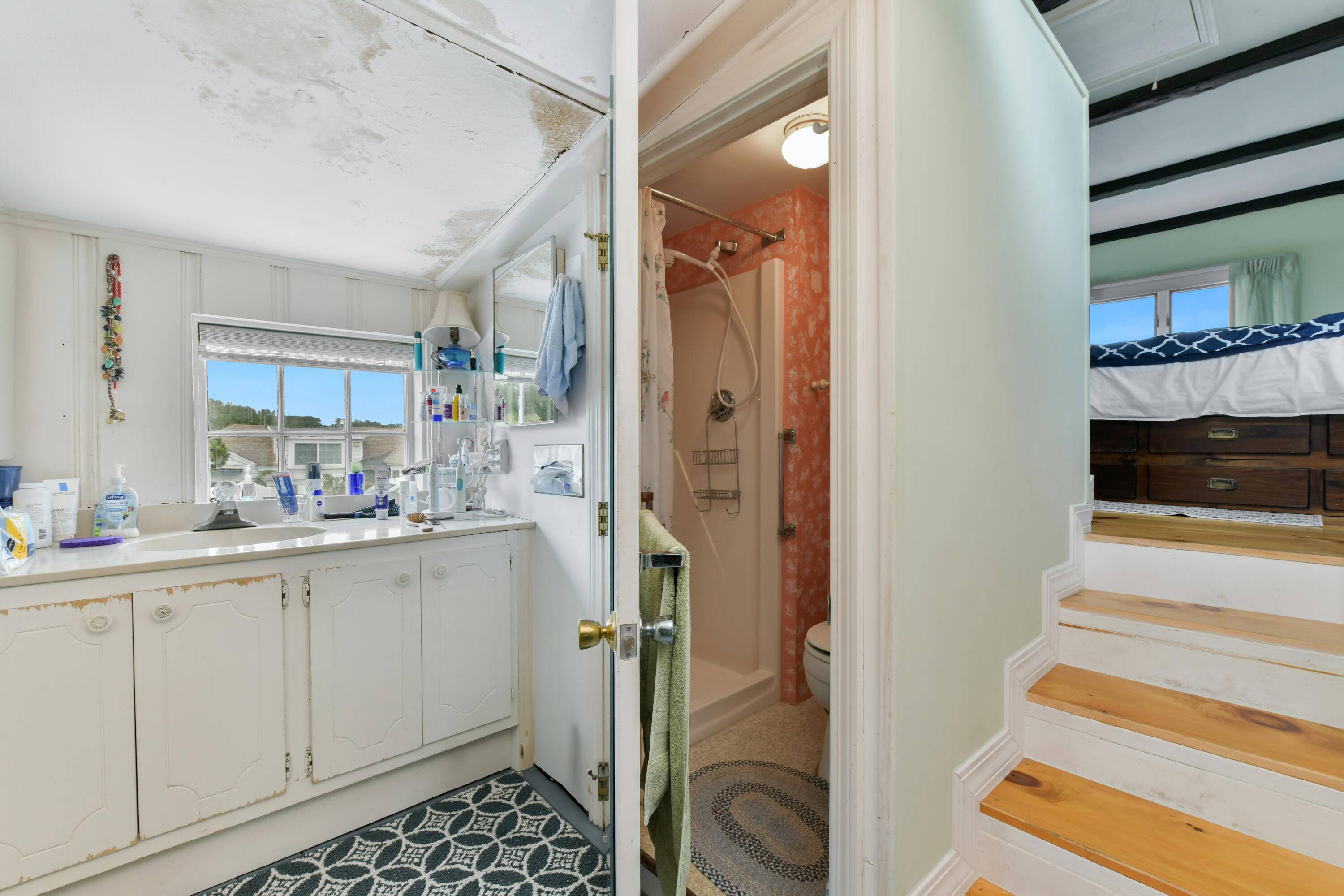 645 South Orleans Road Orleans, MA 02653 - Photo 24 of 57 a bathroom with a sink and a mirror