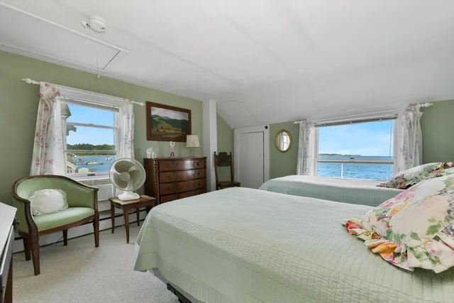 a bedroom with a bed and a walk in closet