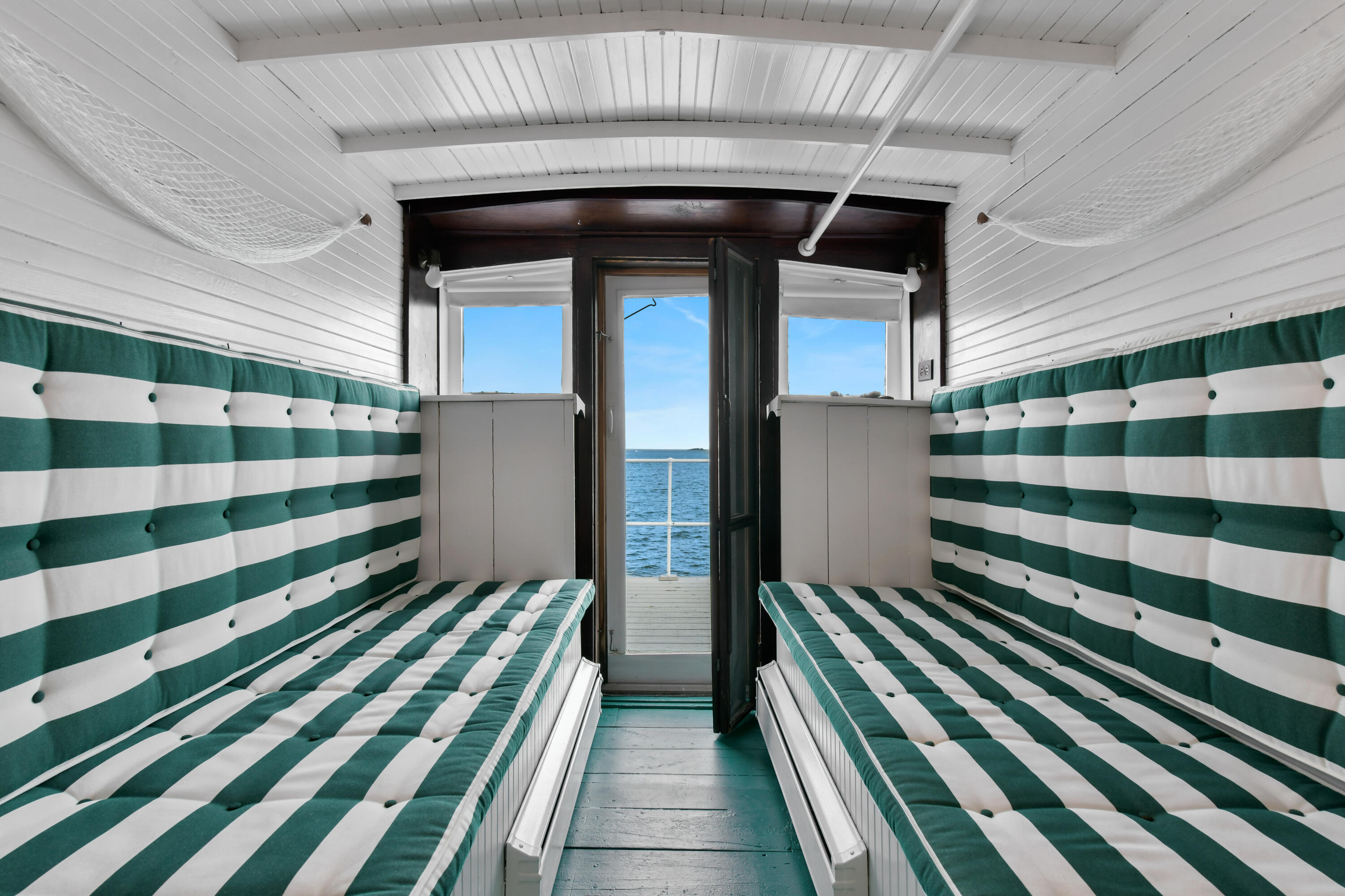 645 South Orleans Road Orleans, MA 02653 - Photo 27 of 57 a bedroom with a bed and a walk in closet