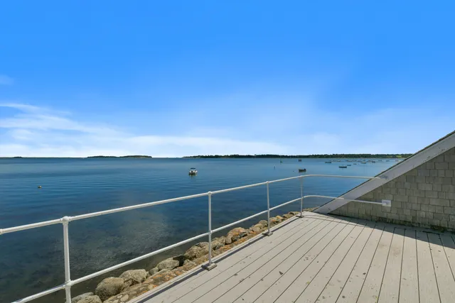a view of a chairs and table in patio
