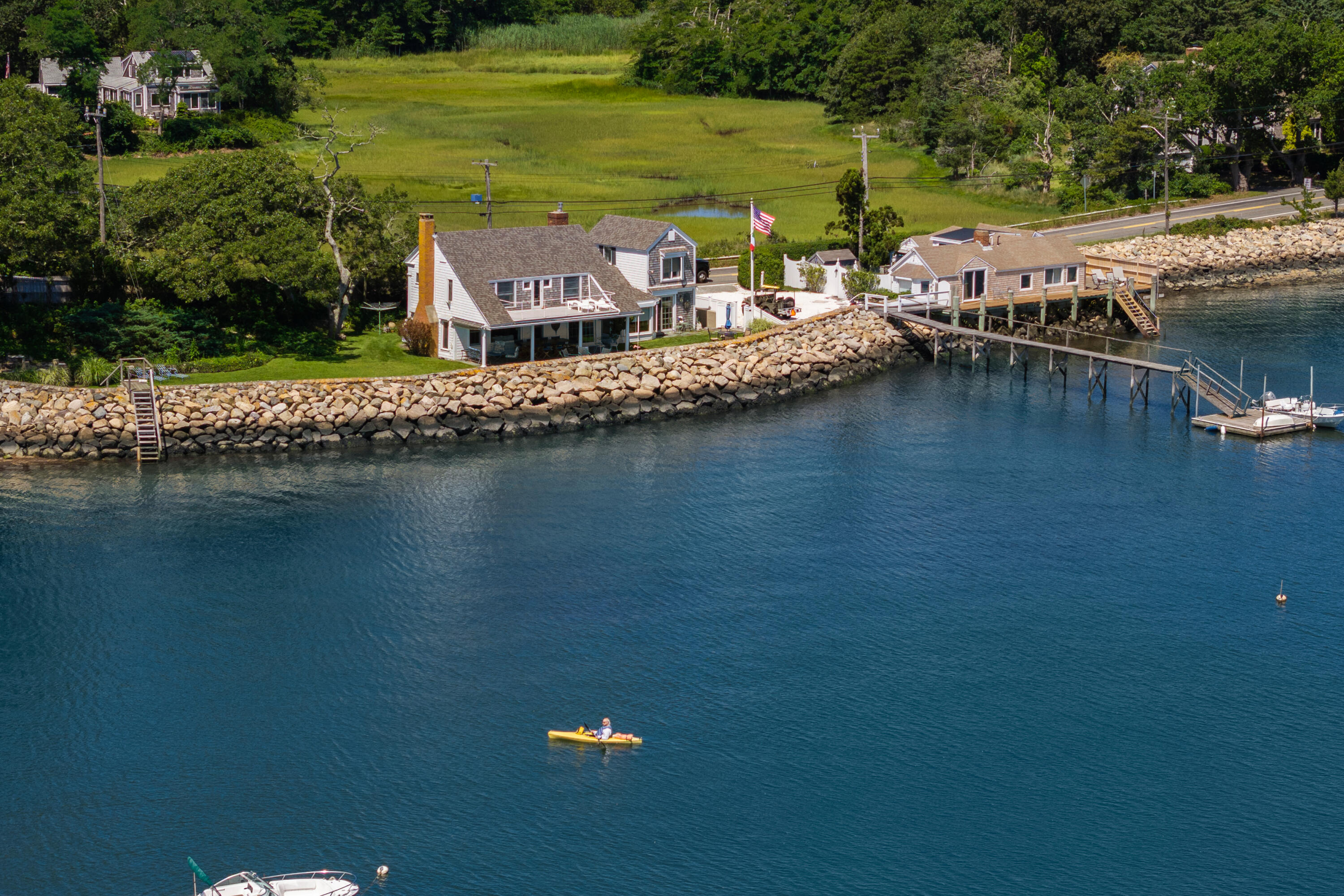 645 South Orleans Road Orleans, MA 02653 - Photo 3 of 57 a view of a lake with houses