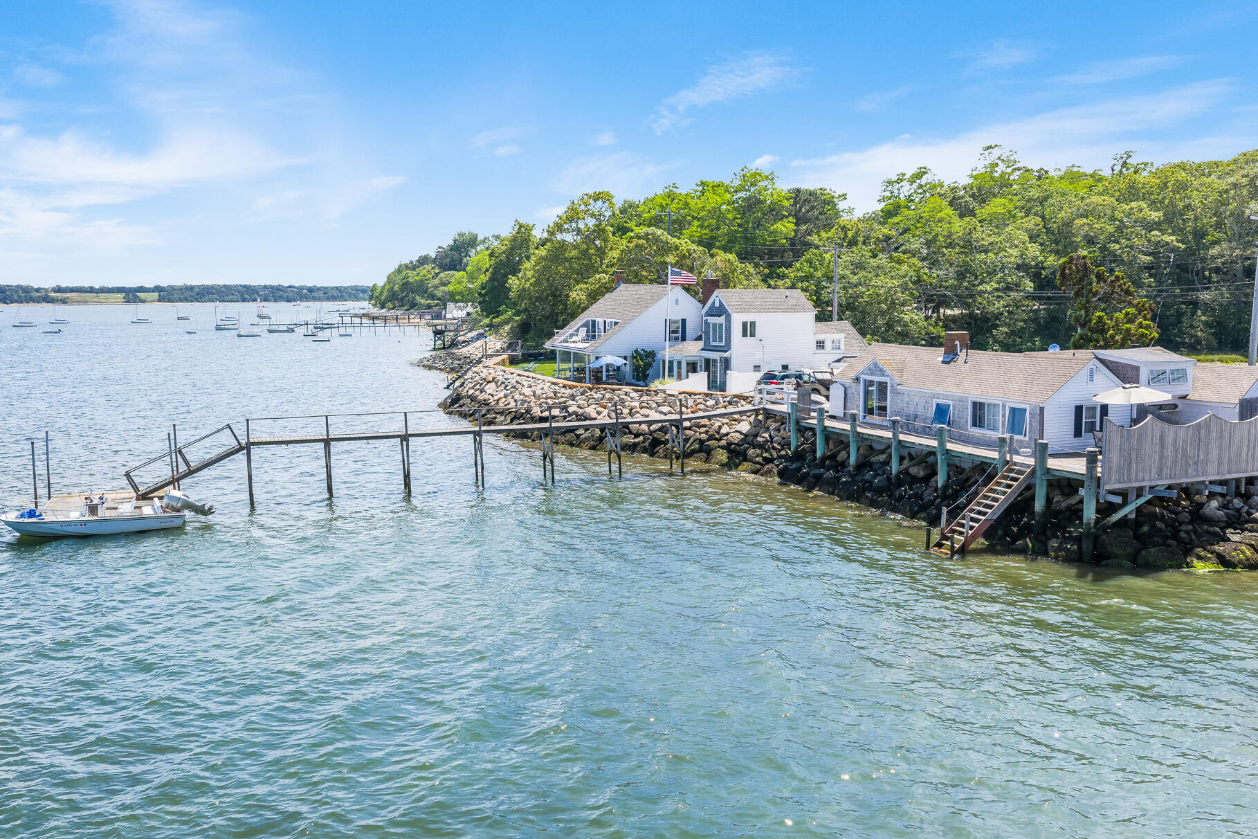645 South Orleans Road Orleans, MA 02653 - Photo 56 of 57 a view of a terrace with a lake view