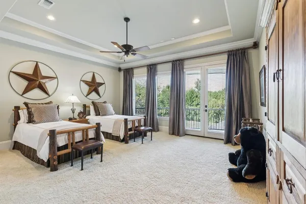 a bed room with furniture and a window