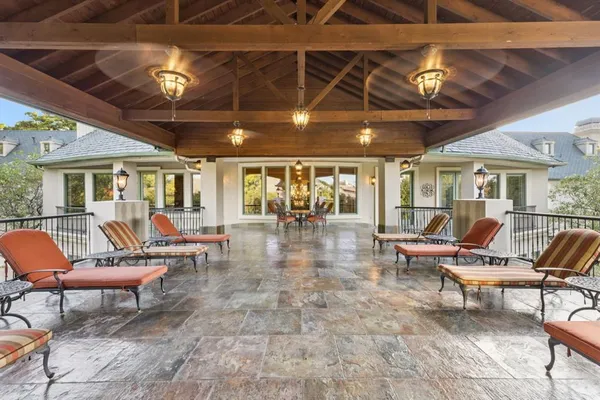 a outdoor space with lots of tables and chairs