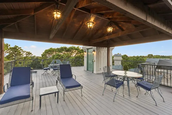 a view of a chairs and table in the patio