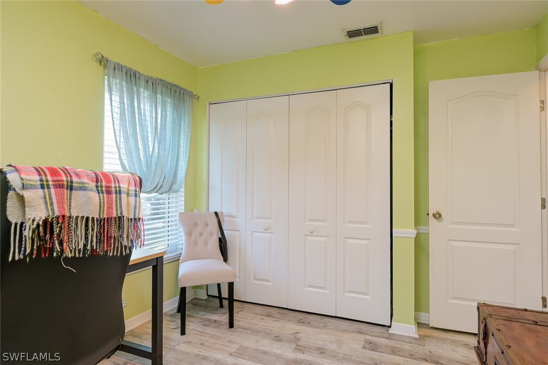 18253 Maple Road Fort Myers, FL 33967 - Photo 20 of 29 a view of a livingroom with furniture and cabinet