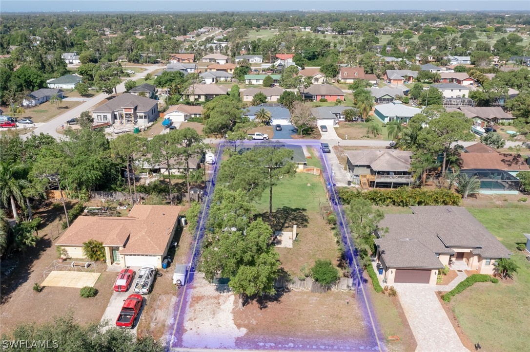 18253 Maple Road Fort Myers, FL 33967 - Photo 27 of 29 an aerial view of residential houses with outdoor space
