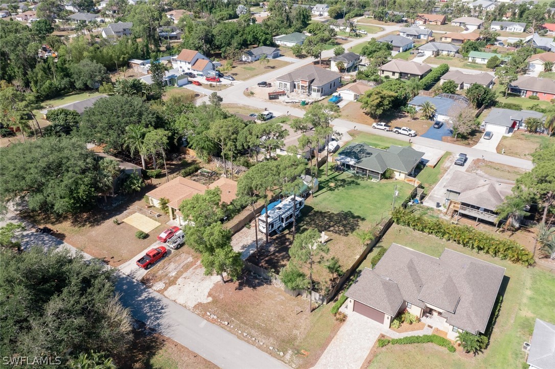18253 Maple Road Fort Myers, FL 33967 - Photo 28 of 29 an aerial view of residential houses with outdoor space