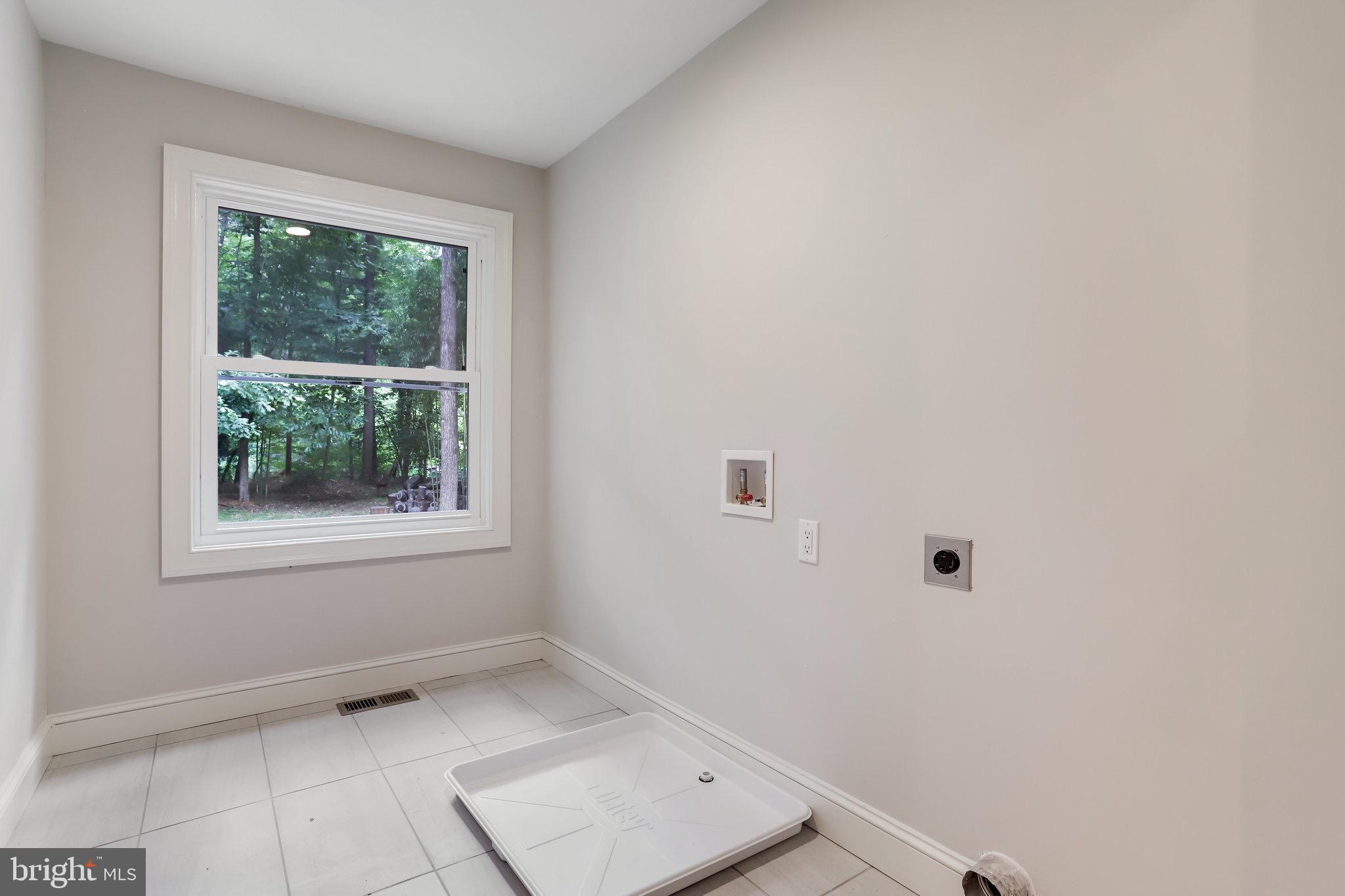 11208 Hunting Horn Lane Reston, VA 20191 - Photo 45 of 69 Upper level laundry