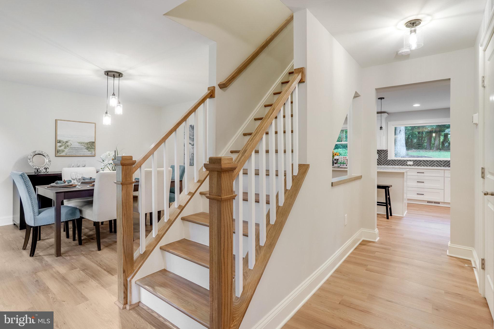 11208 Hunting Horn Lane Reston, VA 20191 - Photo 7 of 69 Open foyer to dining & living rooms + kitchen