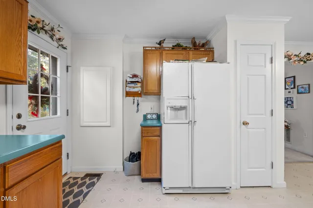 a utility room with closet dryer and washer