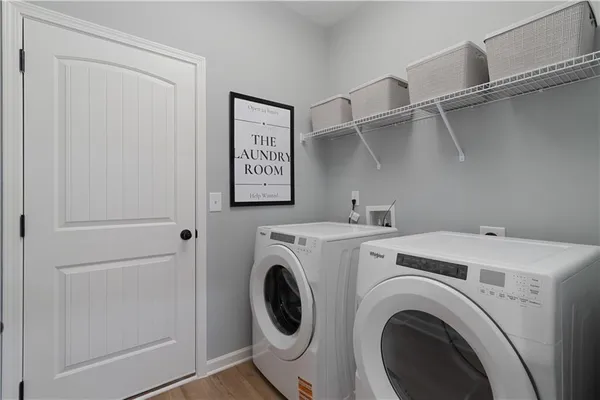 a utility room with dryer and washer