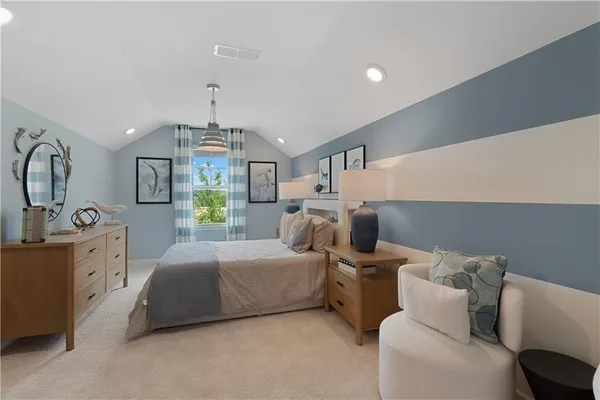 a bedroom with bed and window