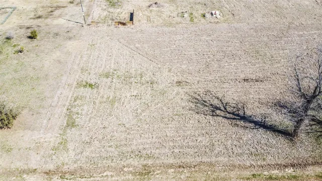 a view of a backyard of a house