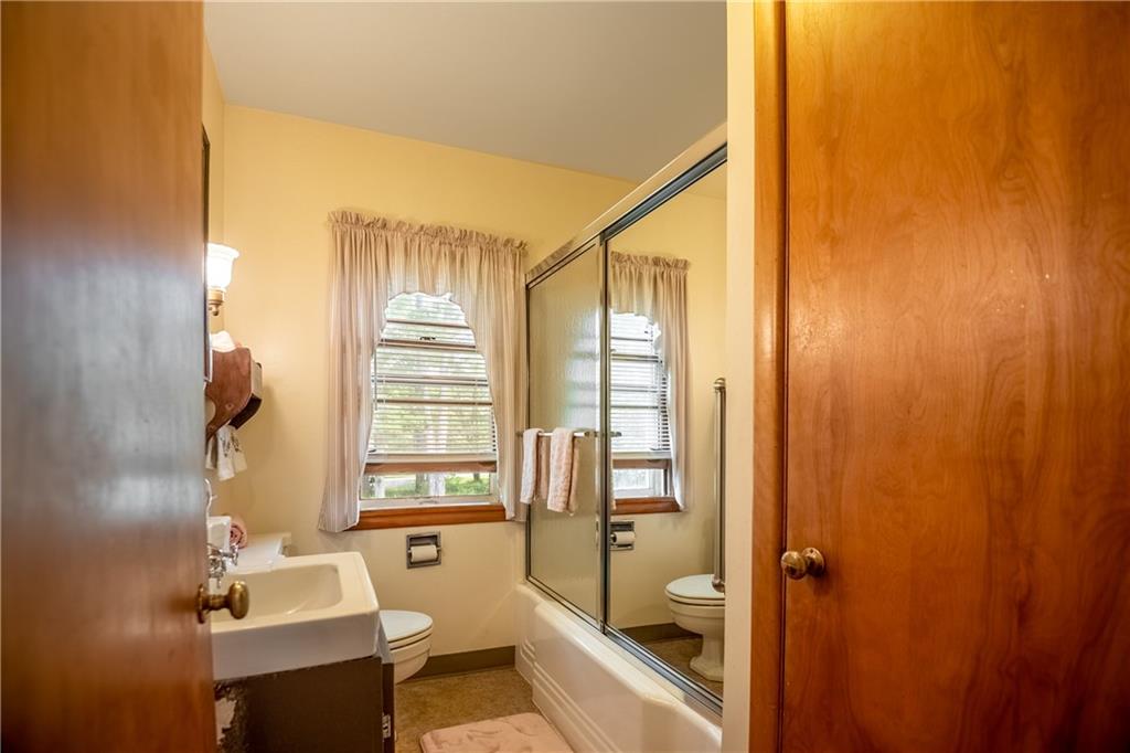 856 Sugar Hollow Road Hermitage, PA 16148 - Photo 15 of 18 a bathroom with a sink toilet and shower
