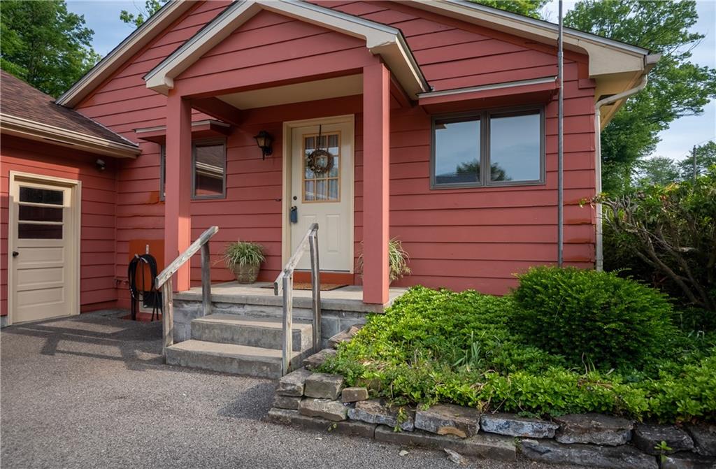 856 Sugar Hollow Road Hermitage, PA 16148 - Photo 2 of 18 a view of a house with a small garden