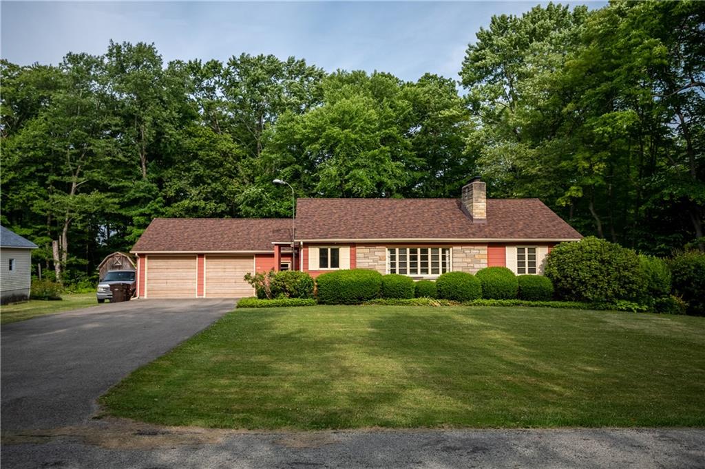 856 Sugar Hollow Road Hermitage, PA 16148 - Photo 3 of 18 front view of a house with a yard