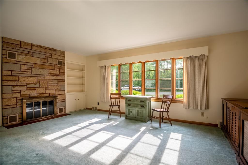 856 Sugar Hollow Road Hermitage, PA 16148 - Photo 4 of 18 a view of a livingroom with furniture and a fireplace