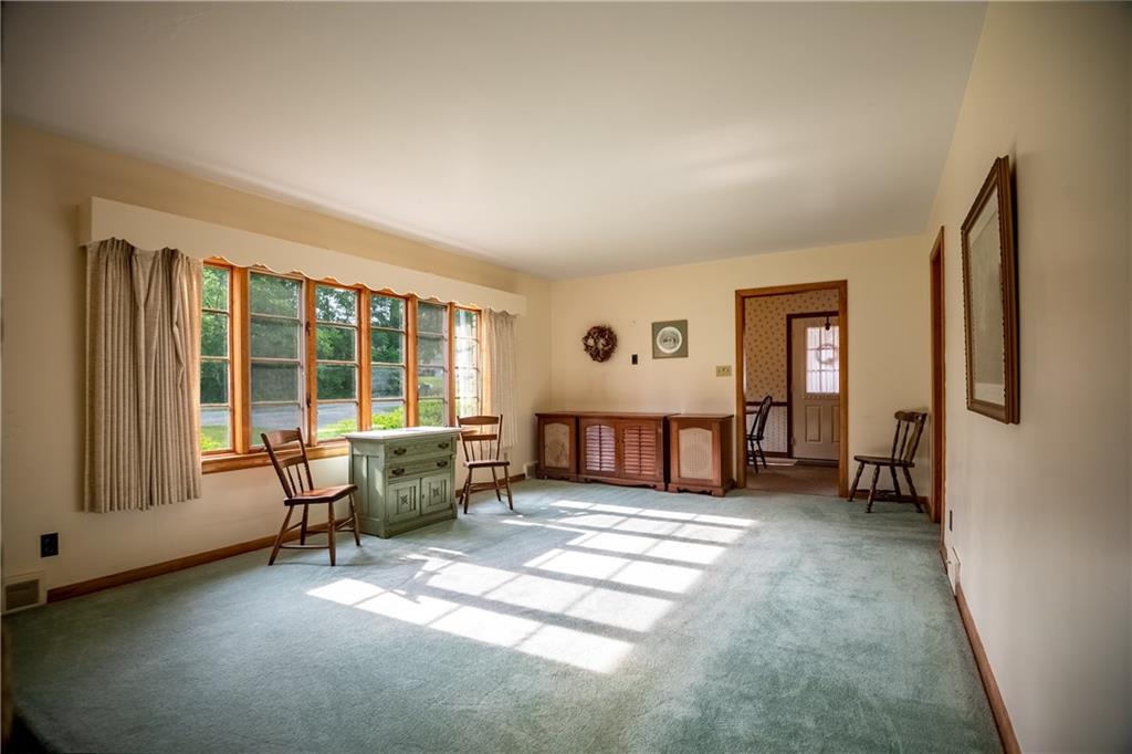 856 Sugar Hollow Road Hermitage, PA 16148 - Photo 6 of 18 a living room with furniture and a window