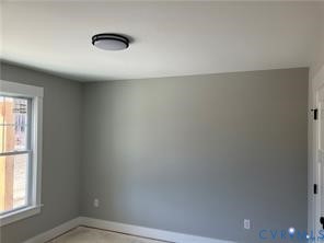 15335 Lebanon Road Spring Grove, VA 23881 - Photo 13 of 28 an empty room with a window