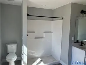 a white bath tub sitting next to a window