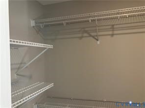 15335 Lebanon Road Spring Grove, VA 23881 - Photo 25 of 28 a view of a room with racks on the wall