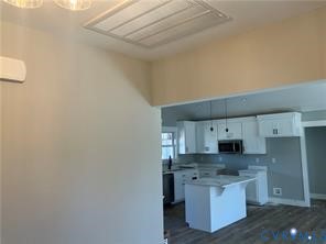 15335 Lebanon Road Spring Grove, VA 23881 - Photo 6 of 28 a kitchen with stainless steel appliances a sink stove and cabinets