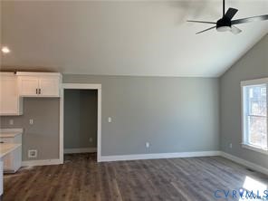 15335 Lebanon Road Spring Grove, VA 23881 - Photo 7 of 28 an empty room with windows and closet