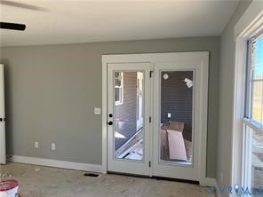 15335 Lebanon Road Spring Grove, VA 23881 - Photo 8 of 28 a bathroom with a glass door and a shower