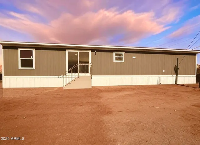 a front view of a house with a garage