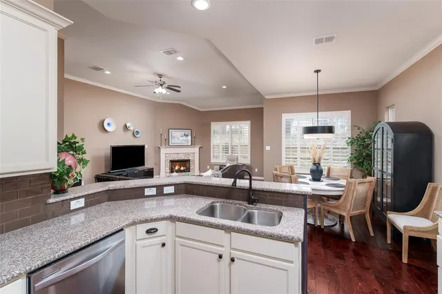 a kitchen with counter space appliances and a sink