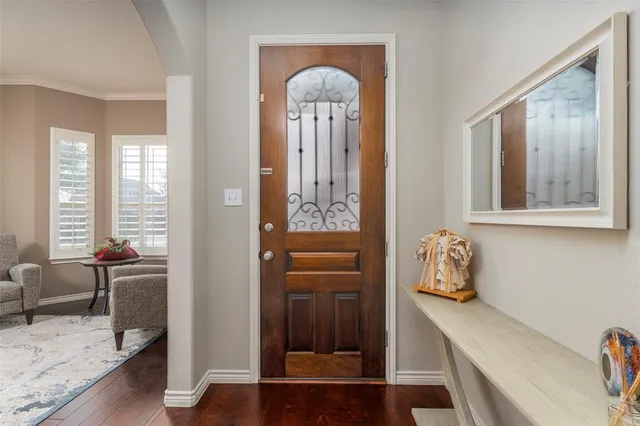 a room with furniture and wooden floor