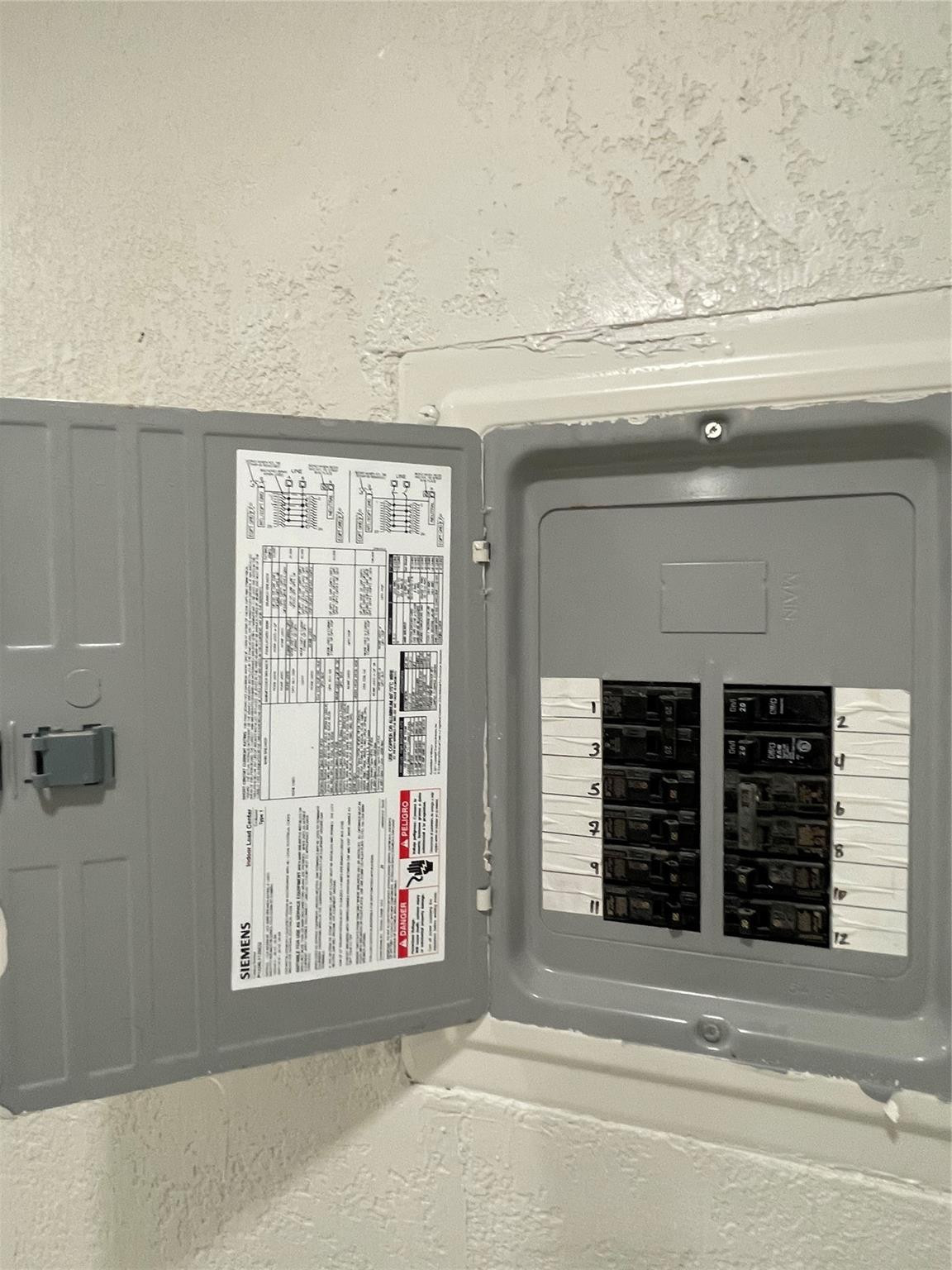 721 Southwest 8th Street Pompano Beach, FL 33060 - Photo 9 of 21 a view of a fireplace and a window