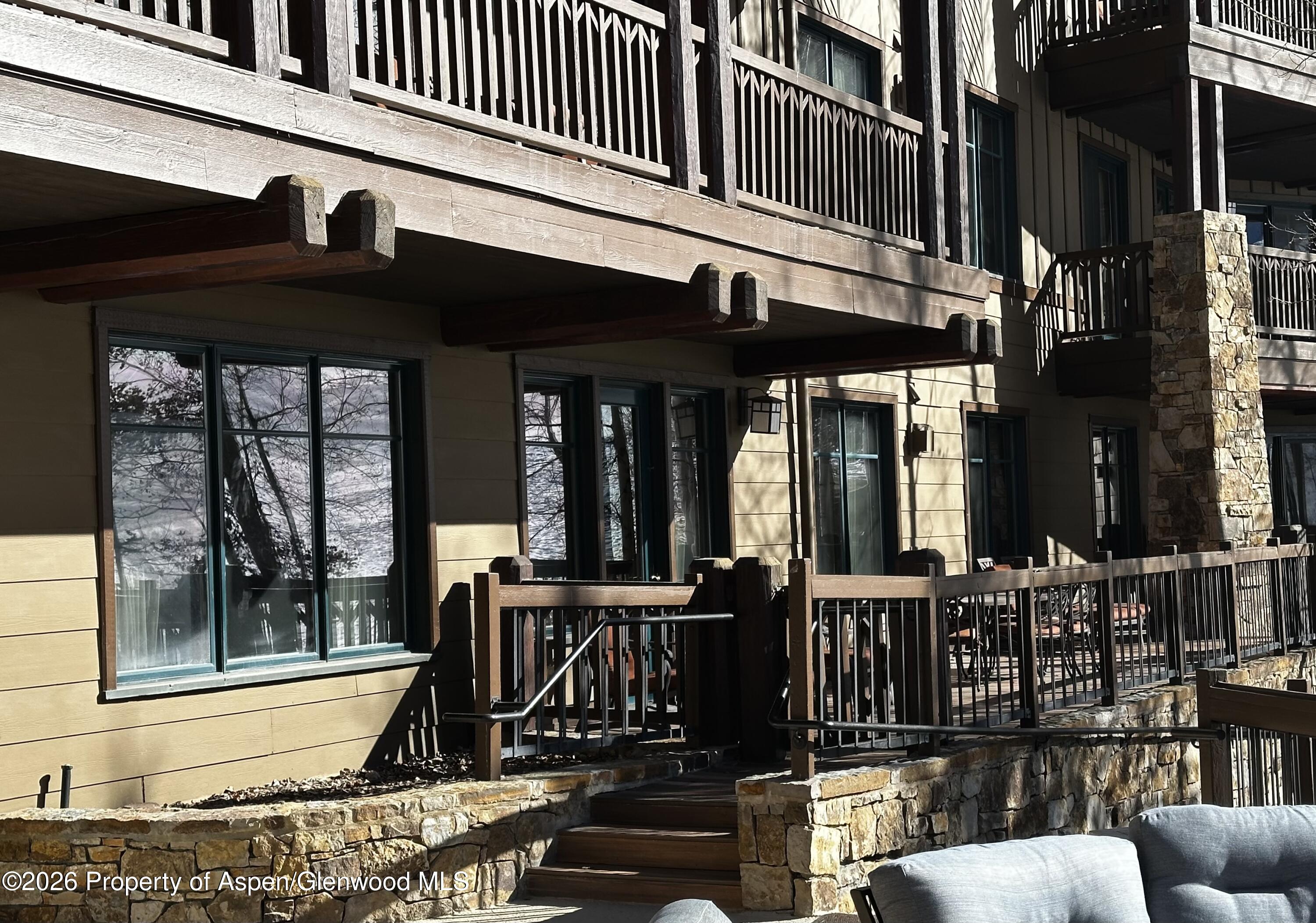 197 Prospector Road, Unit 22052 Aspen, CO 81611 - Photo 9 of 22 front view of a house with a balcony