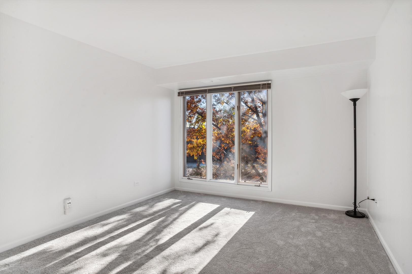 3900 Mission Hills Road, Unit 204 Northbrook, IL 60062 - Photo 12 of 15 an empty room with windows