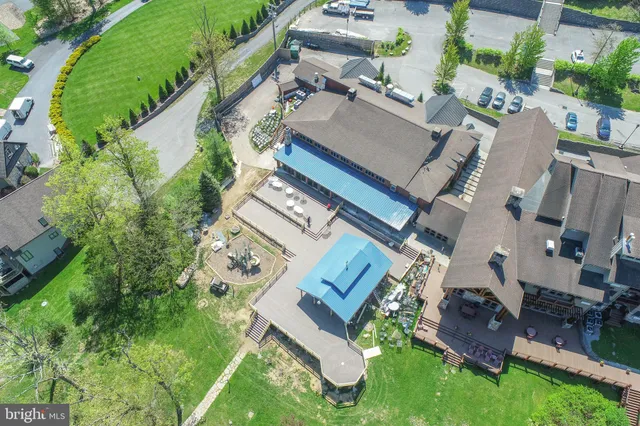 a view of yard with swimming pool and outdoor seating