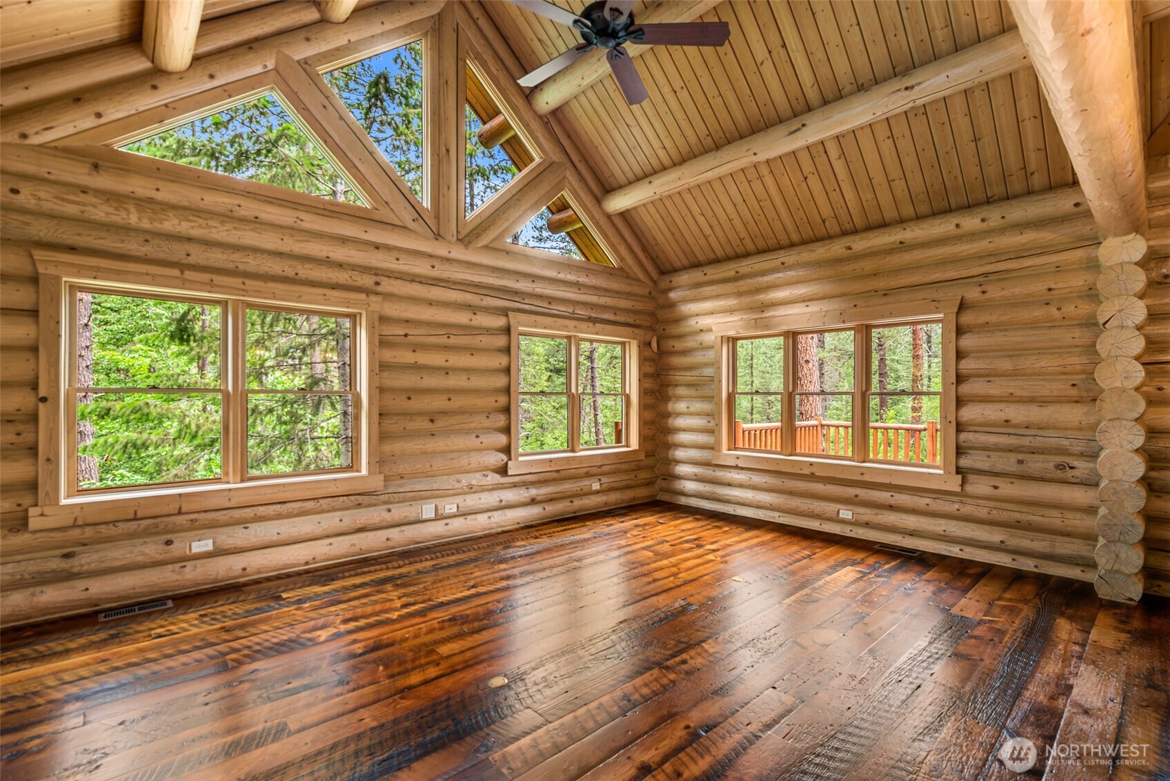 3888 Camas Creek Road Peshastin, WA 98847 - Photo 12 of 40 a view of empty room with wooden floor and fan