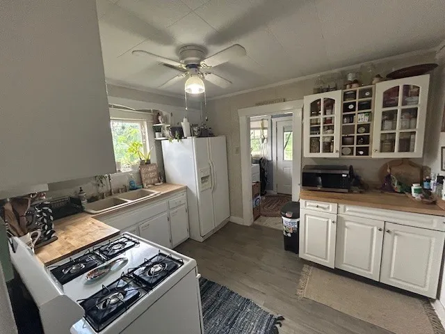 a kitchen with a stove and a sink
