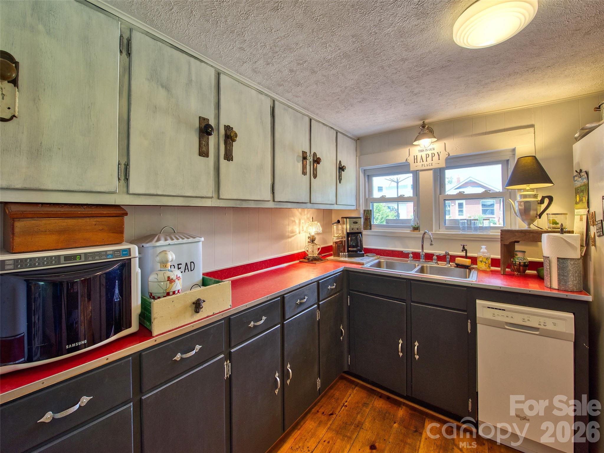 9 Whitted Road Canton, NC 28716 - Photo 17 of 24 a kitchen with a sink cabinets and appliances
