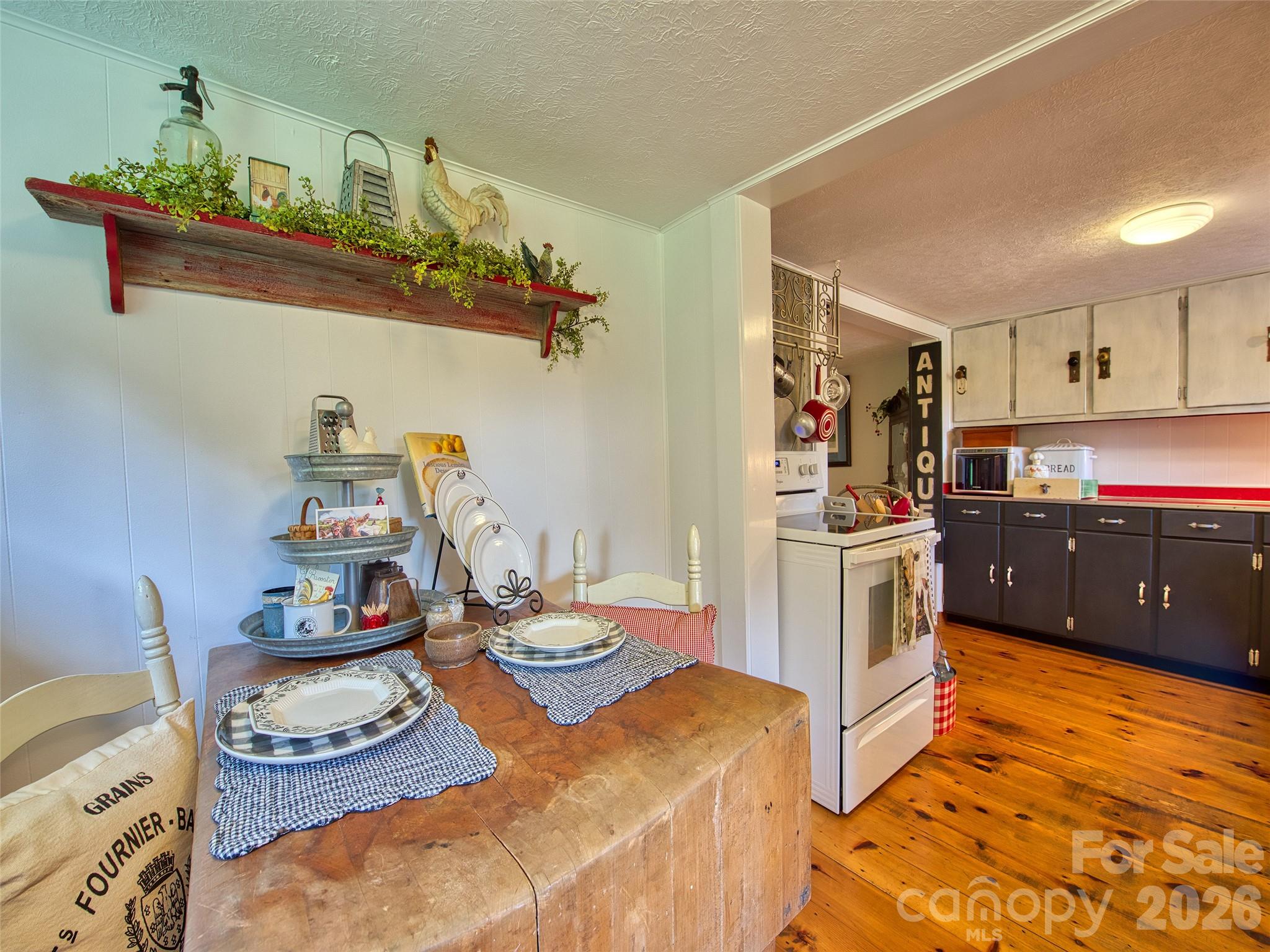 9 Whitted Road Canton, NC 28716 - Photo 19 of 24 a kitchen with a sink and wooden floor