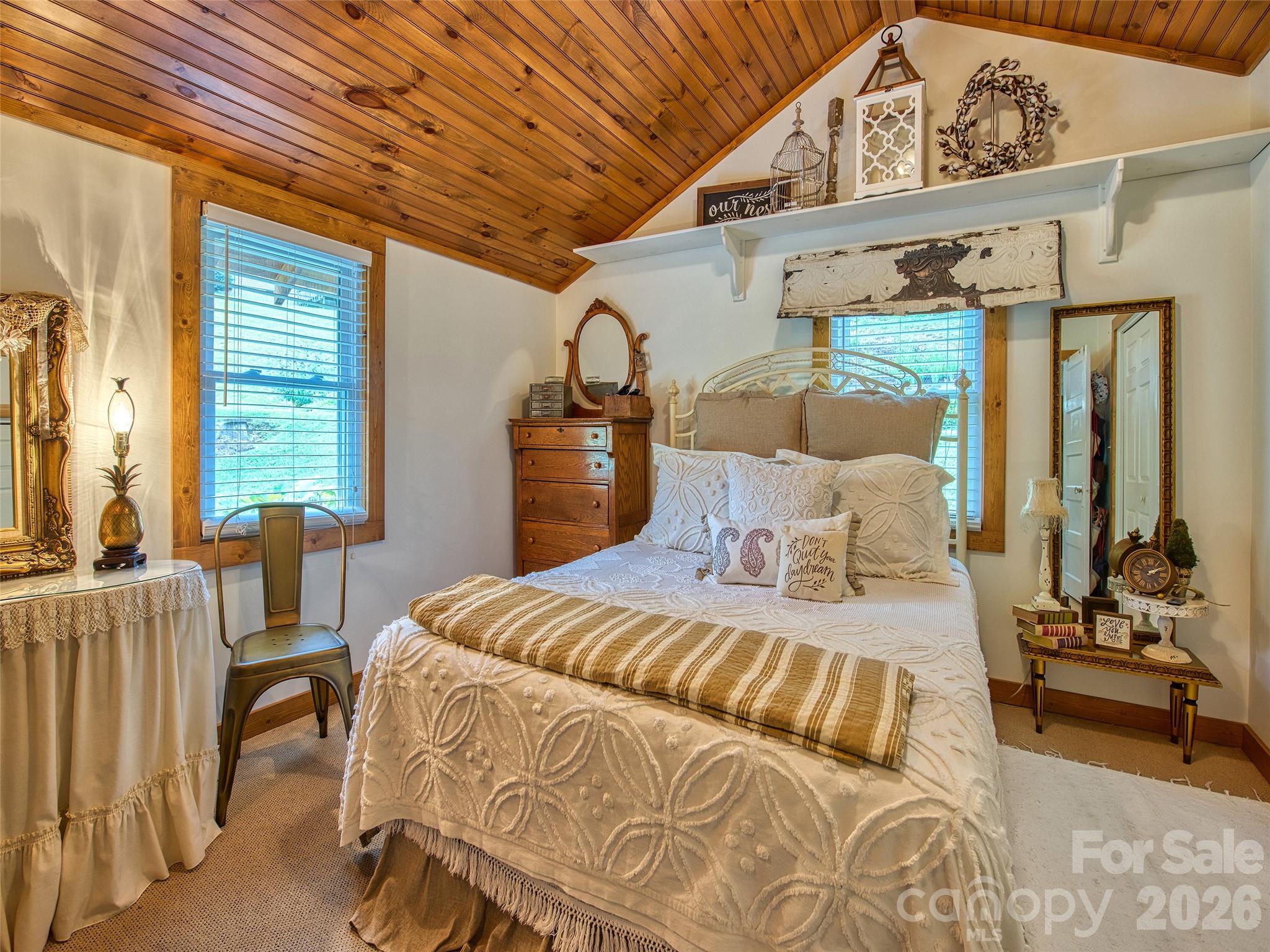 9 Whitted Road Canton, NC 28716 - Photo 21 of 24 a bedroom with a bed and wooden floor