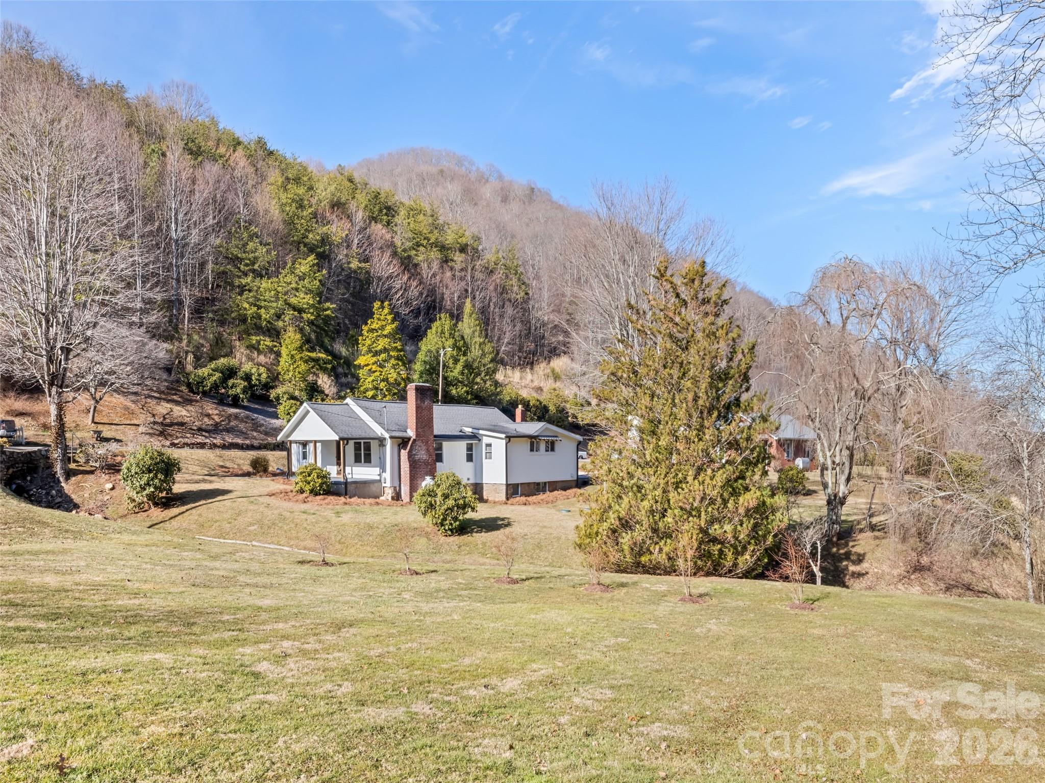 9 Whitted Road Canton, NC 28716 - Photo 5 of 24 a view of a town with mountains in the background