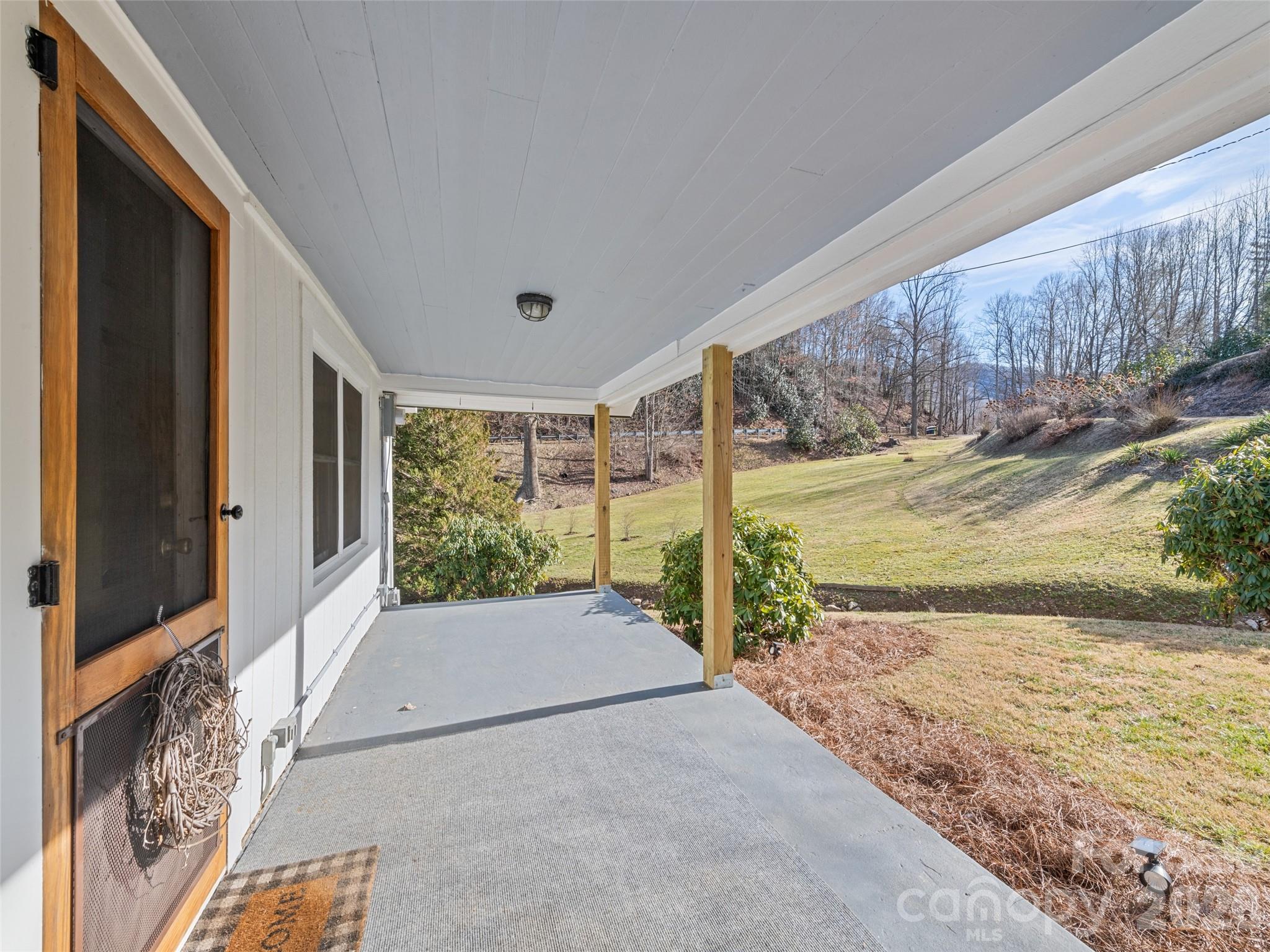9 Whitted Road Canton, NC 28716 - Photo 8 of 24 a view of a backyard of the house