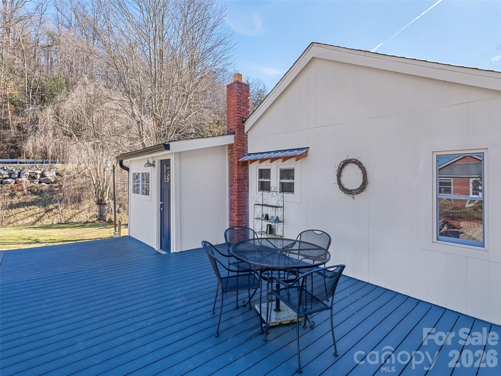9 Whitted Road Canton, NC 28716 - Photo 10 of 24 a view of a dining room with furniture and wooden floor