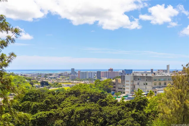a view of a city with tall buildings in the background