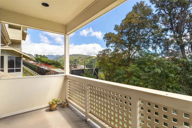 a view of a balcony with chairs